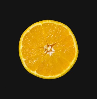 Food, Fruit, Oranges, One single ripe orange cut in half showing core and segments against a black
