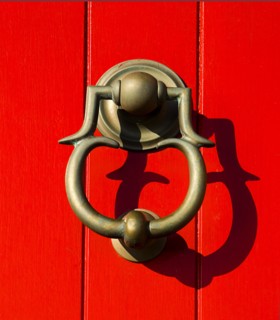 IRELAND, County Dublin, Howth Harbour, Detail of door knocker on lighthouse.