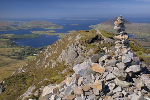 IRELAND, County Galway, Connemara, Diamond Hill, Stone pile at the summit of the hill with