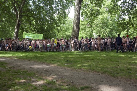 ENGLAND, London, Hyde Park, Naked people with their bicycles on formation, gathered together under