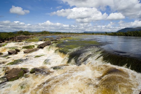 VENEZUELA, Bolivar State, Canaima National Park, Canaima Village, river flowing into Canaima lagoon