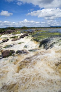 VENEZUELA, Bolivar State, Canaima National Park, Canaima Village, river flowing into Canaima lagoon