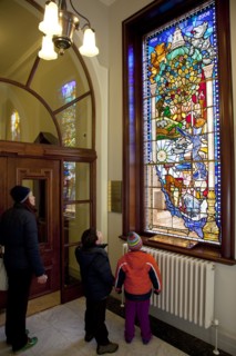 Ireland, North, Belfast, City Hall, Interior,Tourists viewing Centenary Stained Glass Window with