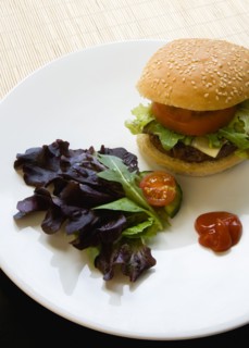 Food, Cooked, Hamburger, Single quarter pound cheeseburger with tomato and lettuce in a bun on a