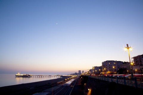England, East Sussex, Brighton, Kemptown, view over Madeira Drive from Marine Parade with the pier