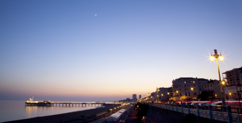 England, East Sussex, Brighton, Kemptown, view over Madeira Drive from Marine Parade with the pier