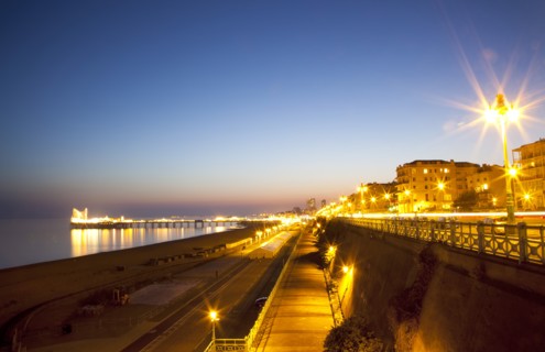 England, East Sussex, Brighton, Kemptown, view over Madeira Drive from Marine Parade with the pier
