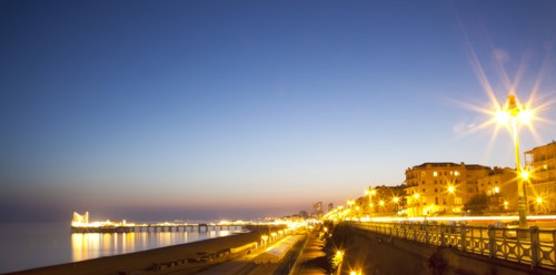 England, East Sussex, Brighton, Kemptown, view over Madeira Drive from Marine Parade with the pier