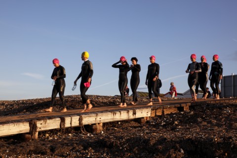 England, West Sussex, Goring-by-Sea, Worthing Triathlon 2009, female competitors making their way