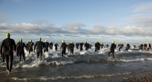 England, West Sussex, Goring-by-Sea, Worthing Triathlon 2009, male competitors at the swim start.