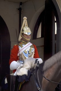 England, London, The Mall, Horse Guards Parade, guardsman on horse in full uniform.