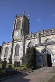 England, West Sussex, East Grinstead, exterior of the Norman Church of St Swithun.