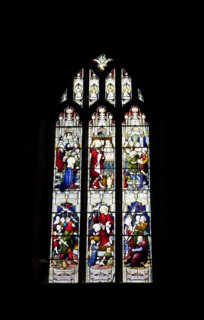 England, West Sussex, East Grinstead, Details of the stained glass windows in Church of St Swithun.