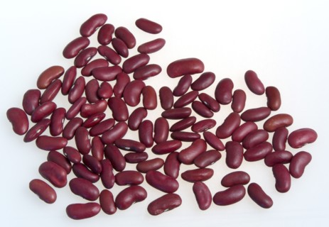 Food, Uncooked, Beans, Red kidney beans scattered on a white surface.