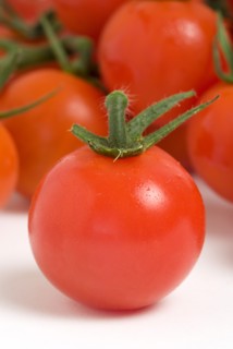 Food, Fruit, Tomato, Ripe red cherry tomatoes on the vine against a white background.