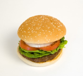 Food, Cooked, Hamburger, Single quarter pound burger with onoin tomato and lettuce in a bun on a