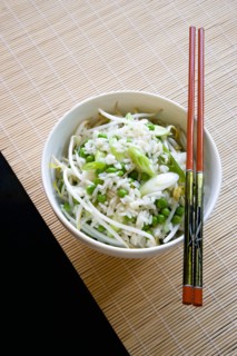 Food, Cooked, Rice, Fried rice with vegetables in a bowl with chopsticks sitting on a bamboo table