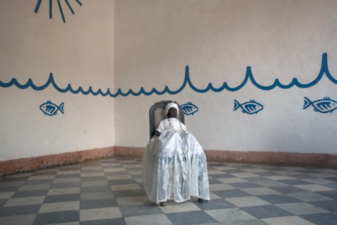 Cuba, Sancti Spiritus, Trinidad, Santeria Yemaya black doll with white dress in Casa Templo de