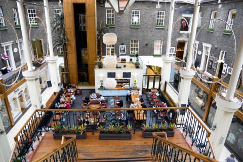 Ireland, County Dublin, Dublin City, Powerscourt Centre restaurants with people at tables beside