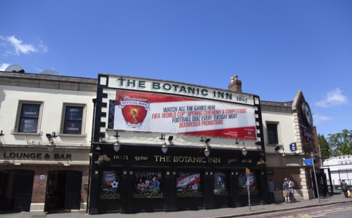 Ireland, North, Belfast, Malone Road, Exterior of the Botanic Inn bar with world cup banner on the