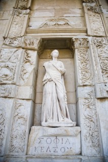 Selcuk, Izmir Province, Turkey. Ephesus. Statue set in alcove of ornately carved wall in ancient