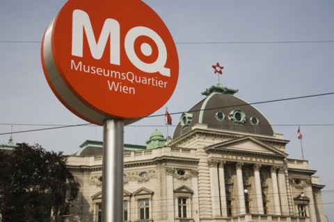Vienna, Austria. Neubau District. Circular information sign with MQ in white on orange to indicate