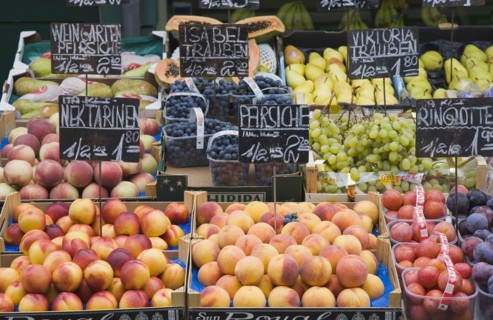 Vienna, Austria. The Naschmarkt. Display of fresh fruit for sale including peaches nectarines
