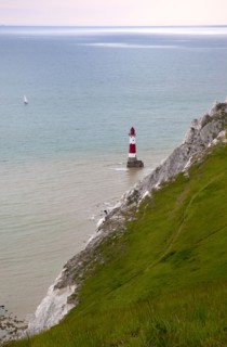 Eastbourne, East Sussex, England. Beachy Head view of the lighthouse at the base of the chalk