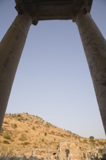 Selcuk, Izmir Province, Turkey. Ephesus. Pair of marble columns supporting roof framing ruins