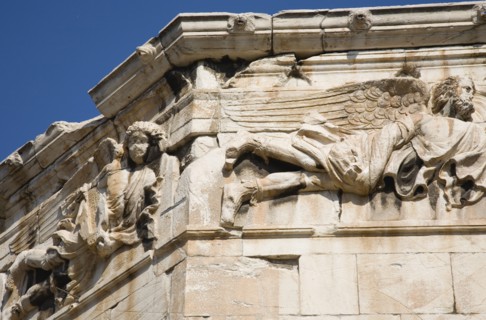 Athens, Attica, Greece. Tower of the Winds. Part view of octagonal Pentelic marble Roman clocktower