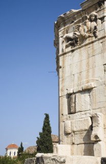 Athens, Attica, Greece. Tower of the Winds on the Agora in Athens. Part view of octagonal Pentelic