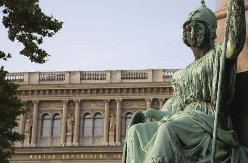 Budapest, Pest County, Hungary. Empire era bronze statue outside the Hungarian Academy of Sciences.