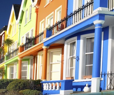 Whitehead, County Antrim, Ireland. Colourfully painted terraced houses with balconies. Ireland