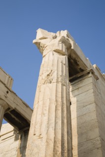 Athens, Attica, Greece. Acropolis Propylaea gate against clear blue summer sky from low viewpoint