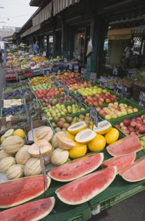 Vienna, Austria. The Naschmarkt. Display of fresh fruit for sale on stall outside shopfront