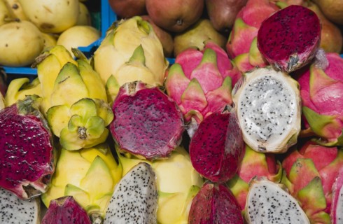 Vienna, Austria. The Naschmarkt. Exotic fruit for sale on market stall. Genus Hylocereus sweet