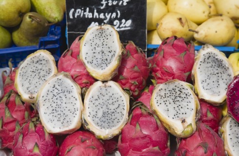 Vienna, Austria. The Naschmarkt. Exotic fruit for sale on market stall. Genus Hylocereus sweet