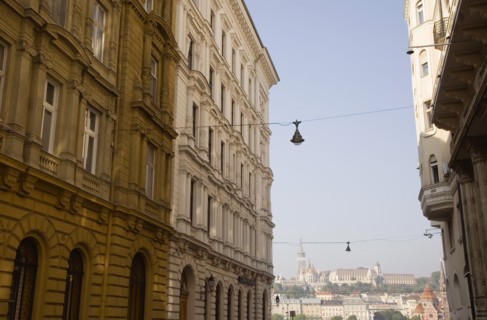 Budapest, Pest County, Hungary. Part view of apartment buildings in Pest on the banks of the River