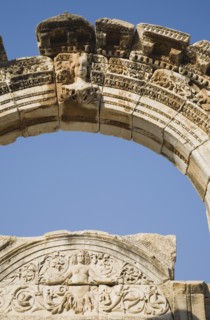 Selcuk, Izmir Province, Turkey. Ephesus. Detail of carved archway and wall relief against clear
