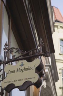 Vienna, Austria. Neubau District. Indian restaurant facade and hanging sign. Austria Austrian