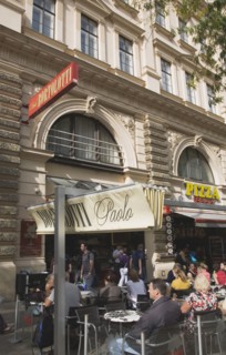 Vienna, Austria. Cafe exterior with customers seated at outside tables. Austria Austrian Republic