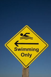 Shoreham-by-Sea, West Sussex, England. Sign indicating stretch of beach suitable for safe swimming.