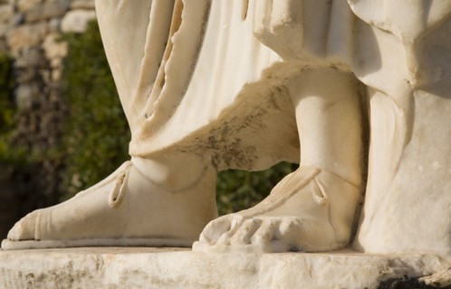 Selcuk, Izmir Province, Turkey. Ephesus. Detail of feet of marble statue in ancient city of Ephesus