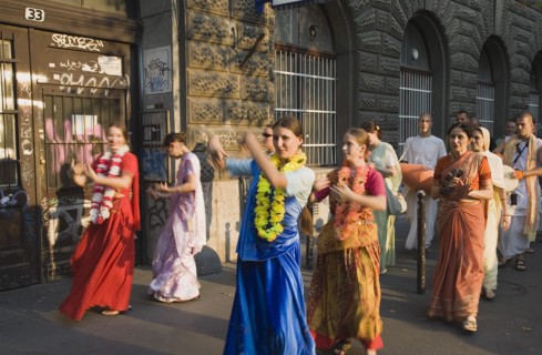 Budapest, Pest County, Hungary. Hare Krishna devotees singing and dancing on Andrassy UtIn Pest
