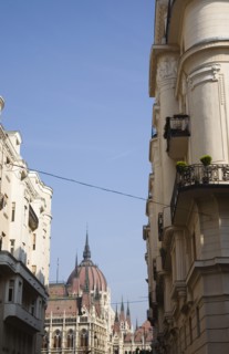 Budapest, Pest County, Hungary. Art Nouveau era apartment facades with view towards the Hungarian