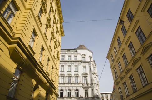 Vienna, Austria. White and yellow painted exterior facades of restored buildings. Austria Austrian