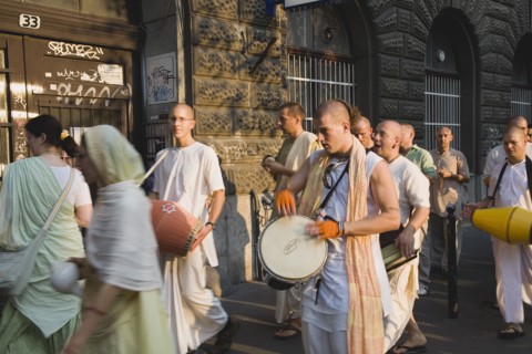 Budapest, Pest County, Hungary. Hare Krishna devotees singing and dancing on Andrassy UtIn Pest