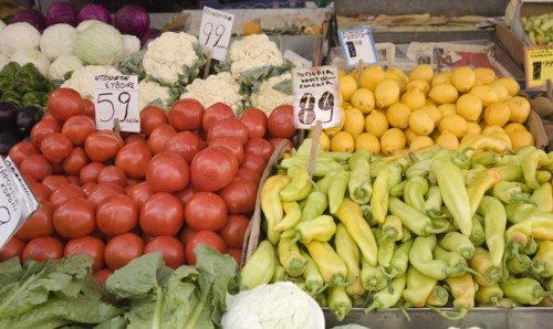 Athens, Attica, Greece. Central market. Display of fruit and vegetable summer produce on grocers