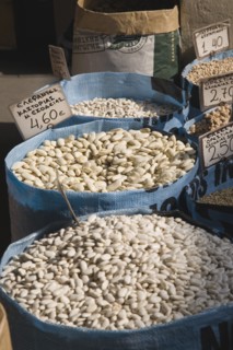 Athens, Attica, Greece. Sacks of beans for sale on food stall in central market. Greece Greek