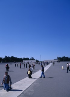 Fatima, Biera Litoral, Portugal. Pilgrims on knees making thier way toward the church & shrine